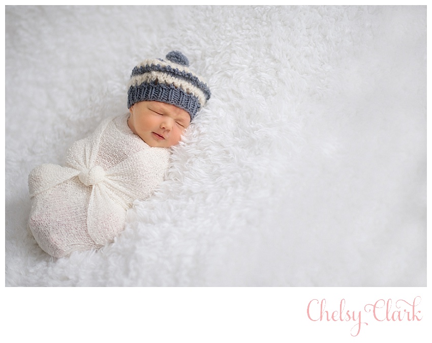 Denver Newborn Photographer with Knotted Wrap and Cute Hat